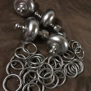 4 Finials and curtain rod rings.